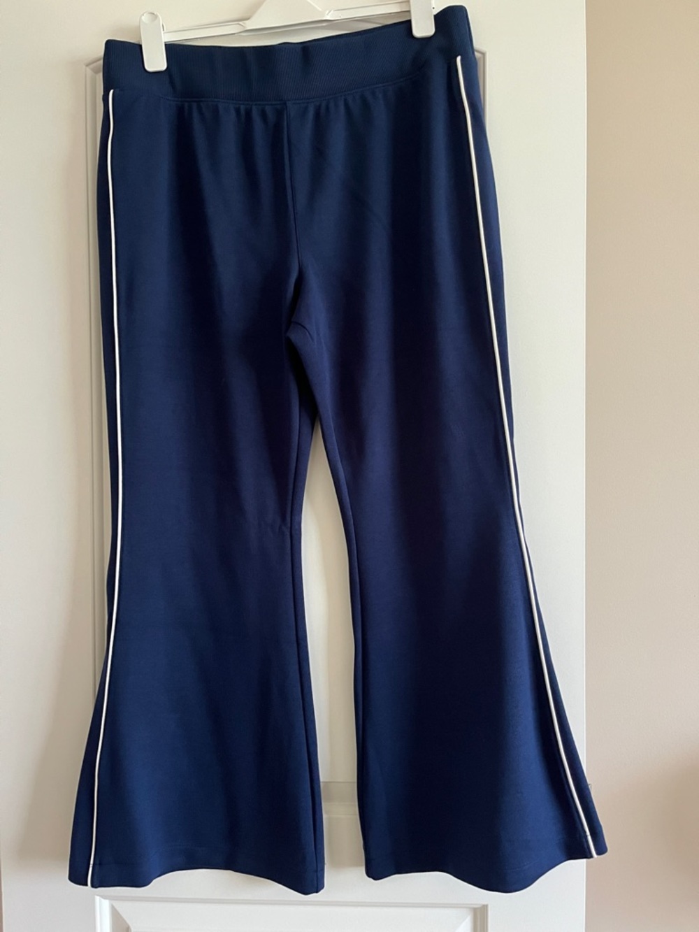 SPANX Navy Airpique Flare Track Pants in Timeless Navy-white piping on side NWT